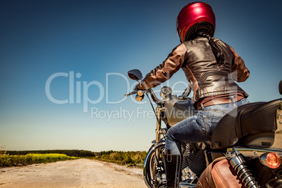 Biker girl on a motorcycle