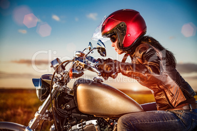 Biker girl on a motorcycle