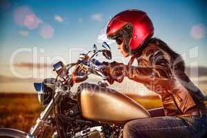 Biker girl on a motorcycle