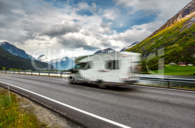 Caravan car travels on the highway.