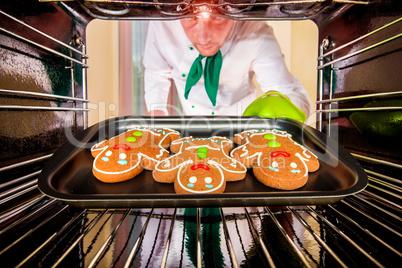 Baking Gingerbread man in the oven