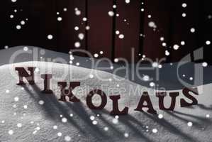 Nikolaus Means Santa Claus On Snow And Snowflakes