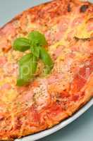 Pizza with salmon and shrimps