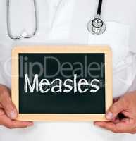 Measles - Doctor with chalkboard
