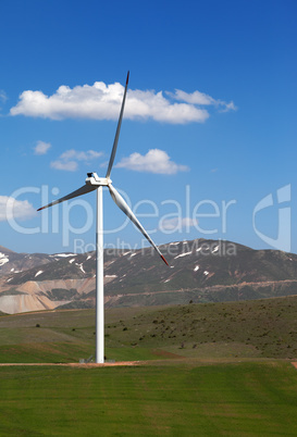 Wind turbine at nice spring day