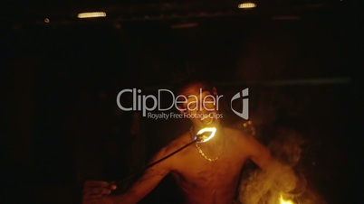 Fire eater performing at night