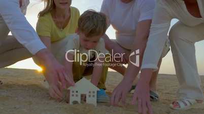 Boy Building a House