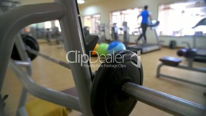 Bench press exerciser in modern gym