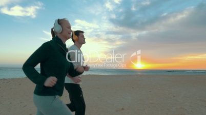 Jogging on the beach at sunset