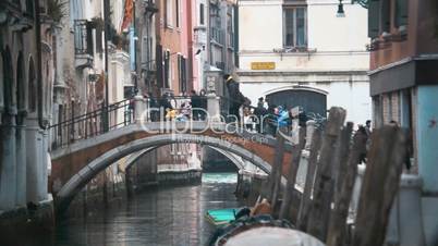 Venetian cityscape with bridge and old houses