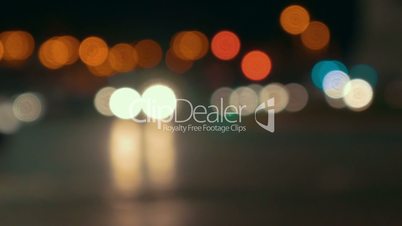 Defocus of city traffic at night