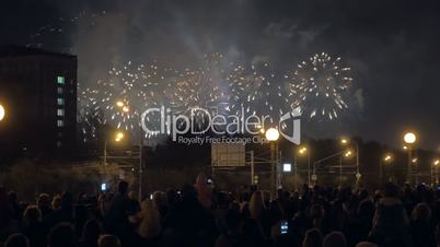 People enjoying fireworks in the city