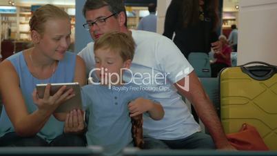 Loving Parents, Son and Tablet PC