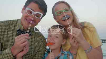 Happy family with hipster accessories outdoor