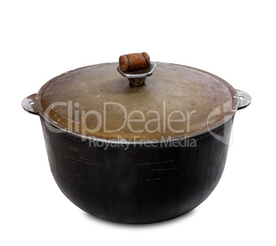 Old black pot on white background