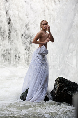 Young Topless Woman In A River