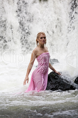 Young Nude Woman Swimming