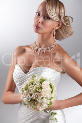 Young Beautiful Woman In A Wedding Dress