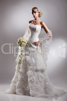 Young Beautiful Woman In A Wedding Dress