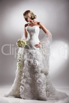 Young Beautiful Woman In A Wedding Dress