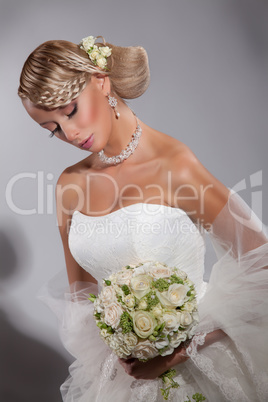 Young Beautiful Woman In A Wedding Dress