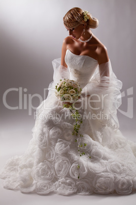 Young Beautiful Woman In A Wedding Dress