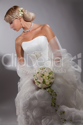 Young Beautiful Woman In A Wedding Dress