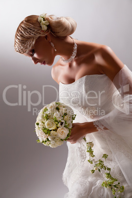 Young Beautiful Woman In A Wedding Dress