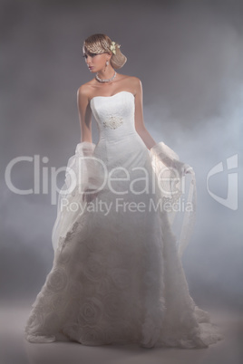 Young Beautiful Woman In A Wedding Dress