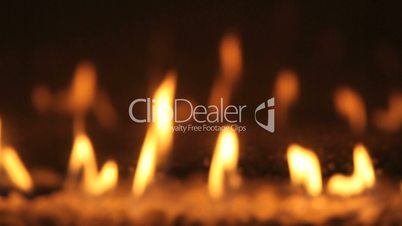 Closeup of blurry burning flames in a chimney