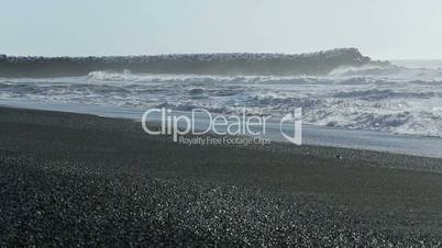 Waves at the black sand beach in Vik, Iceland