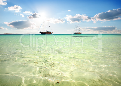 Two sailboats in sea