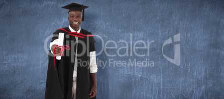 Composite image of man smilling at graduation