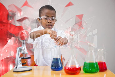 Composite image of cute pupil playing scientist