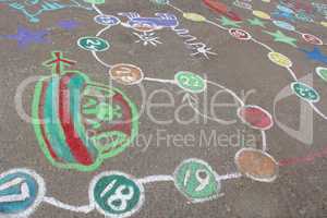 childish drawings as a game on the asphalt