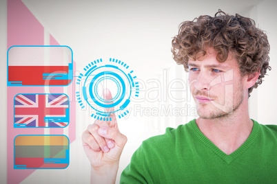 Composite image of handsome man pointing at something