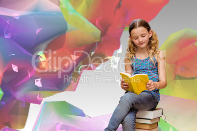 Composite image of cute little girl reading book in library