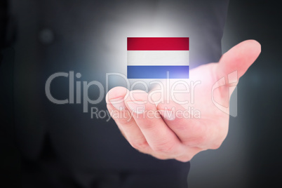 Composite image of businessman holding out his hand Composite image of businessman holding out his hand