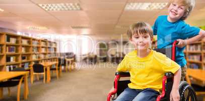 Composite image of happy boy pushing friend on wheelchair