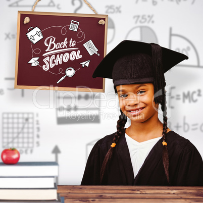 Composite image of cute pupil graduating