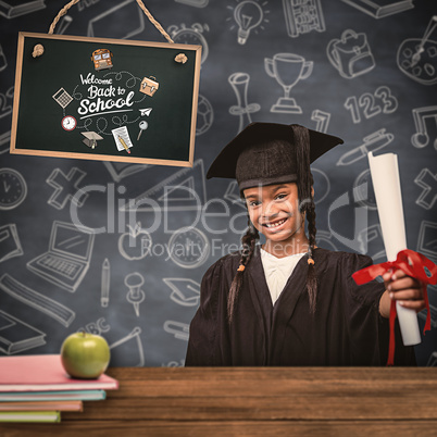 Composite image of cute pupil in graduation robe