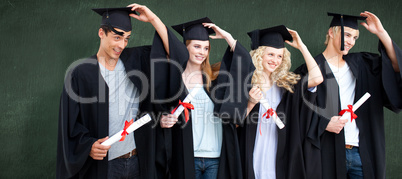 Composite image of group of teenagers celebrating after graduati