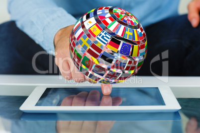 Composite image of close up of finger from man touching tablet