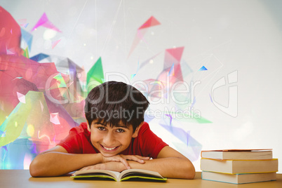Composite image of portrait of boy reading book in library
