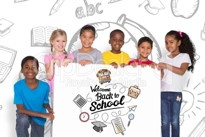 Composite image of elementary pupils showing card