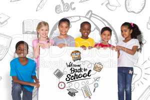 Composite image of elementary pupils showing card