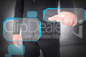Composite image of businessman pointing with finger