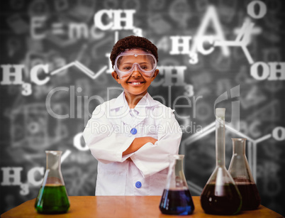 Composite image of cute pupil dressed up as scientist