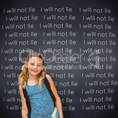 Composite image of cute little girl holding book in library