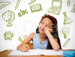 Composite image of cute pupil at desk